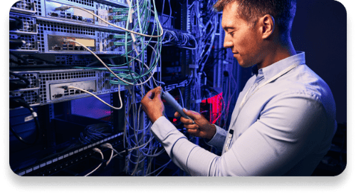 A field engineer focused on configuring a server in a tech environment.