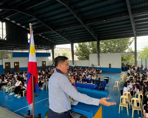 TRT Consulting's service manager speaks to a crowd at the SECLS Days 2024 event held at Holy Cross College.