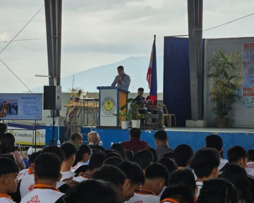 TRT Consulting's service manager speaks to a crowd at the SECLS Days 2024 event held at Holy Cross College.